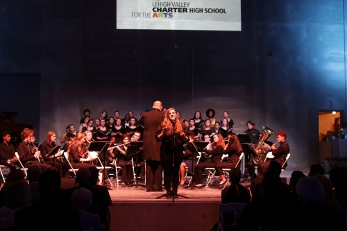 A moving performance by the Charter Arts Wind Ensemble, Touring Choir and Writing Club.